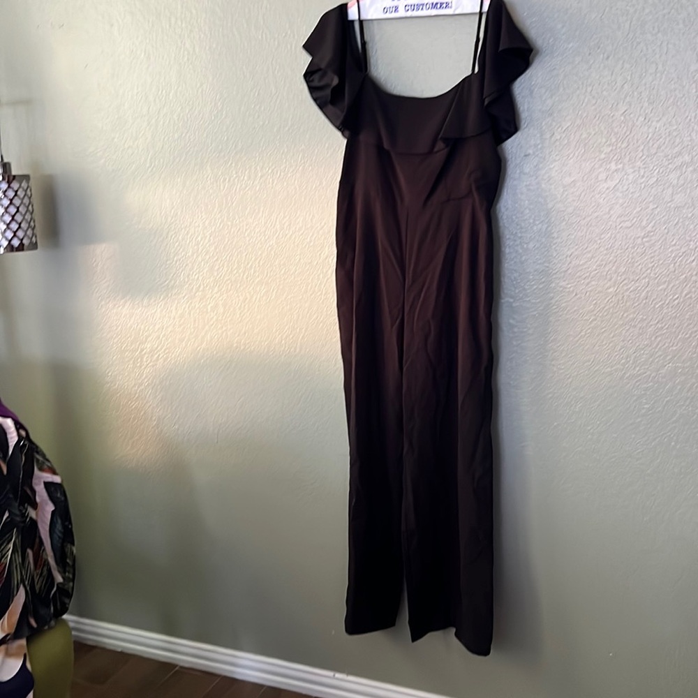 Dressy black jumpsuit with spaghetti straps and off the shoulder sleeves
